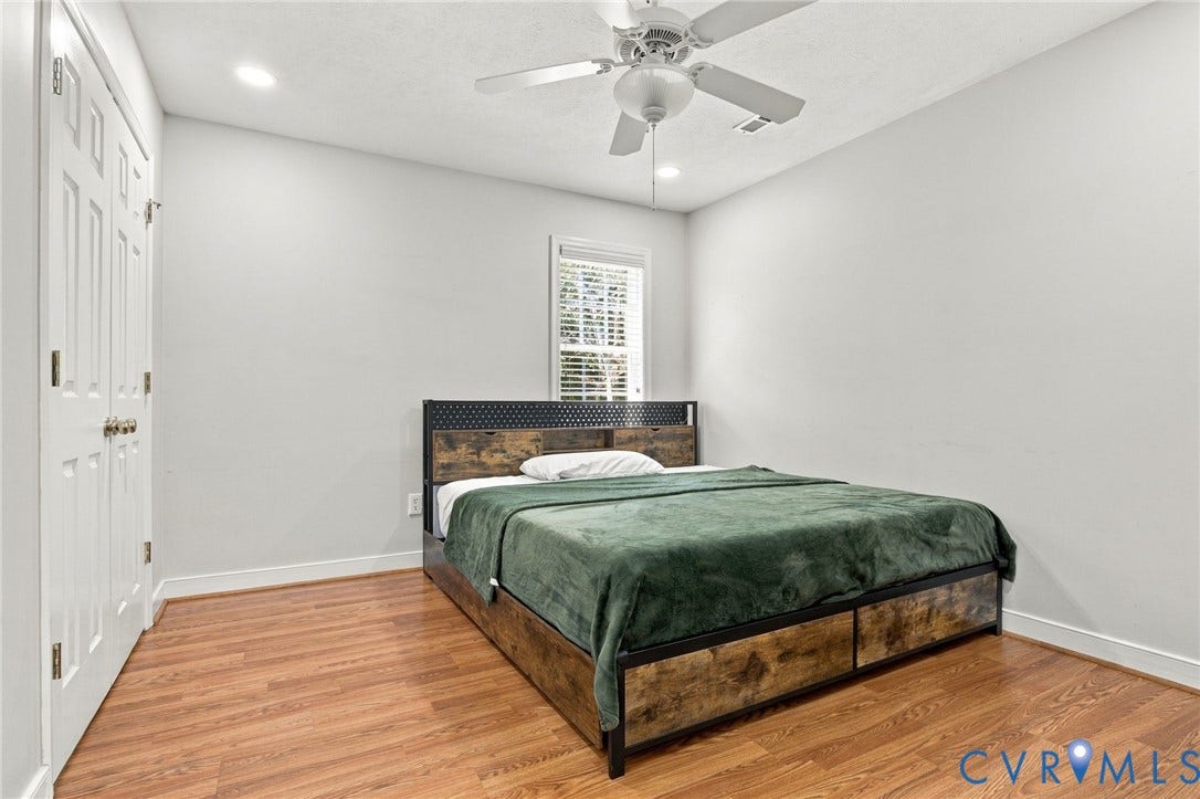 8119 Castle Grove Drive, Mechanicsville, VA 23111 Bedroom with Wood-finish flooring, recessed lighting, ceiling fan, and double-panel doors