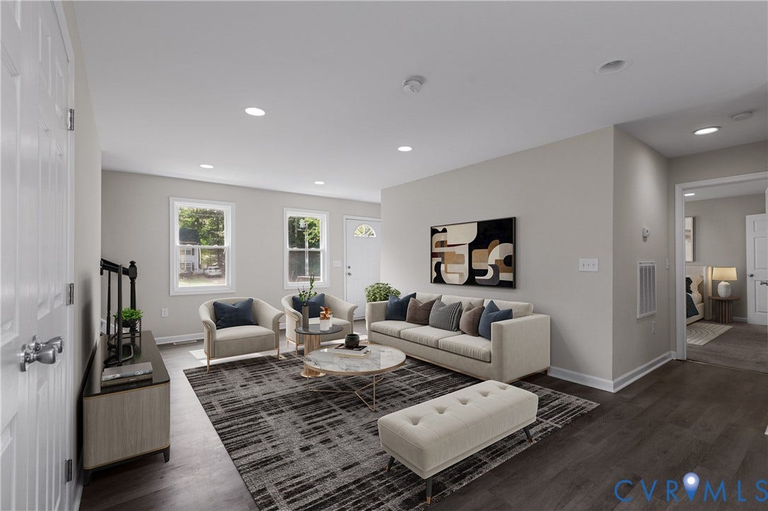 12089 Monterey Road, Ruther Glen, VA 22546 Neutral-toned living space featuring recessed lighting, multi-pane windows, and wood-finish flooring