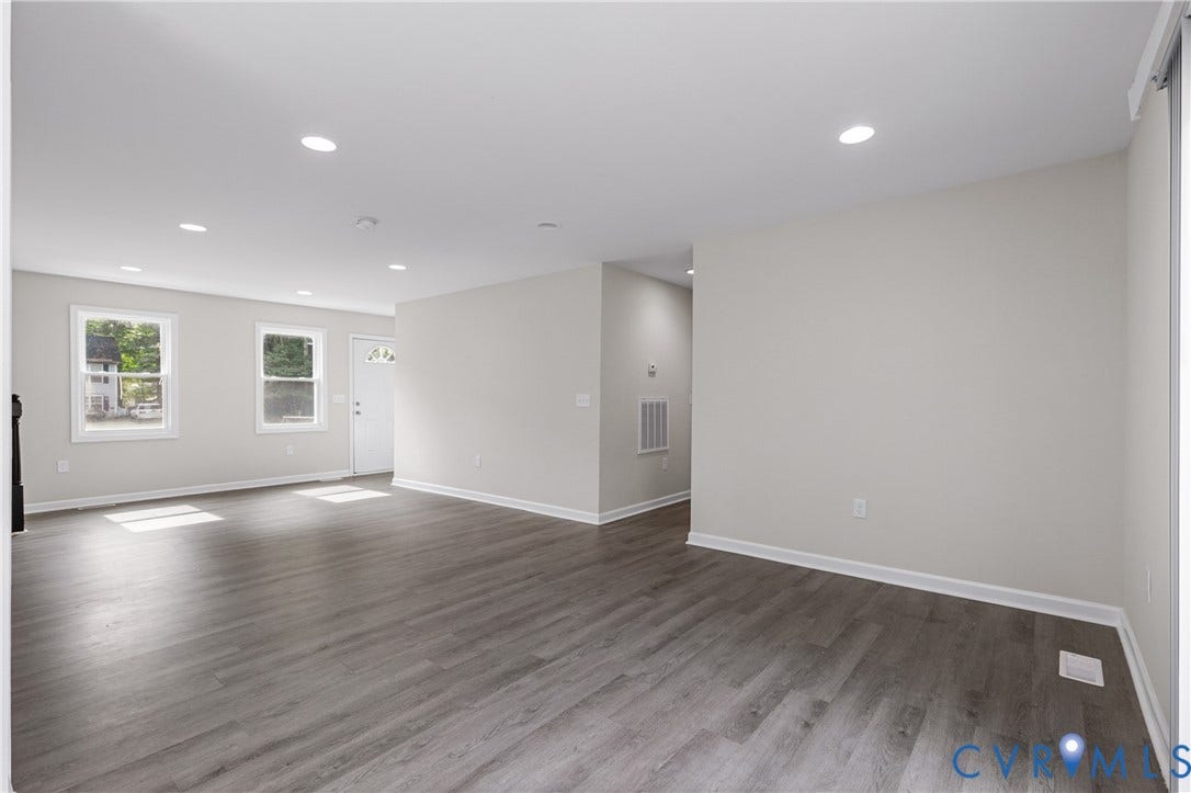 12089 Monterey Road, Ruther Glen, VA 22546 Neutral interior featuring wood-finish flooring, recessed lighting, and multiple windows