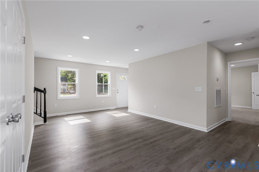 12089 Monterey Road, Ruther Glen, VA 22546 Neutral interior featuring wood-finish flooring, recessed lighting, and crisp wall finishes with clean lines