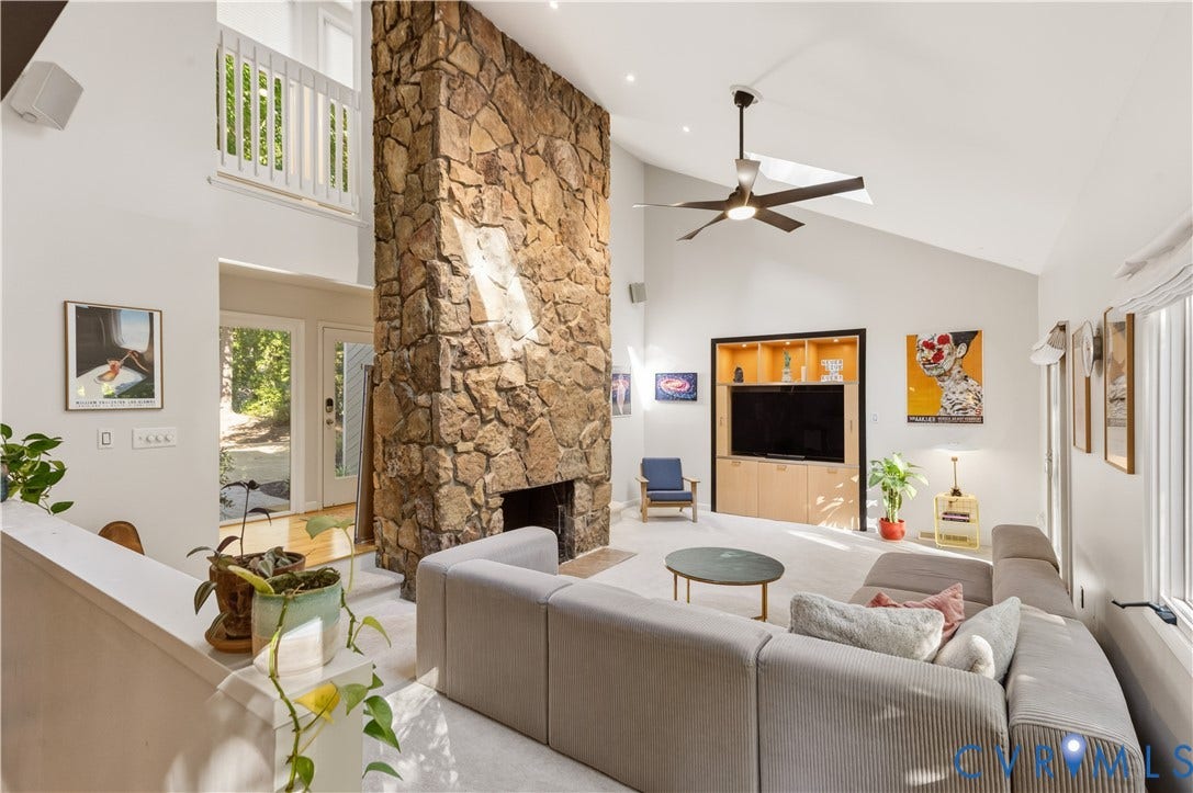 4204 Hickory Nut Place, Winterberry Ridge, Midlothian, VA 23112 Living features a stone fireplace centerpiece, custom built-ins and access to the back patio.