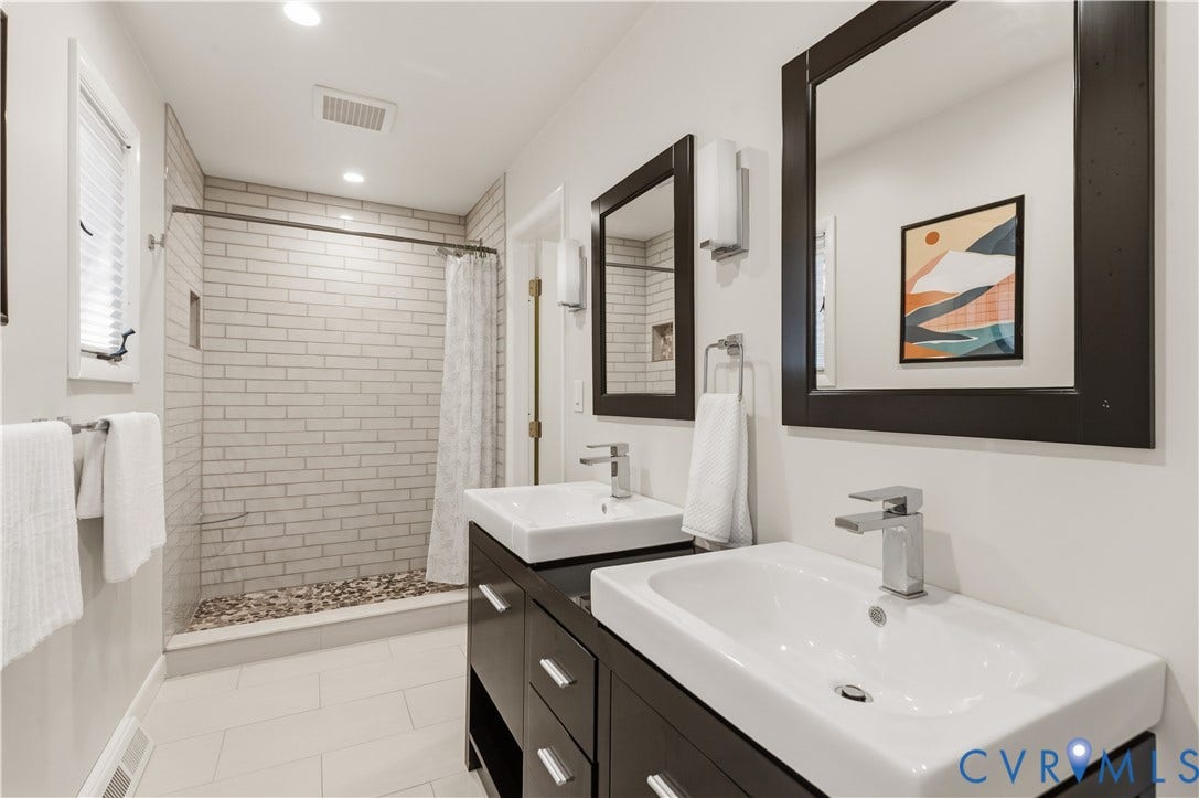 4204 Hickory Nut Place, Winterberry Ridge, Midlothian, VA 23112 First floor primary bath with custom walk-in shower and water closet.