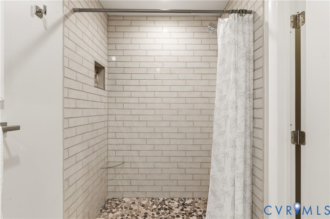 4204 Hickory Nut Place, Winterberry Ridge, Midlothian, VA 23112 Custom tiled shower in the first floor primary bedroom.