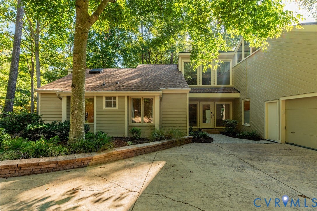 4204 Hickory Nut Place, Winterberry Ridge, Midlothian, VA 23112 Large concrete stamped driveway to the wall of windows front entrance.