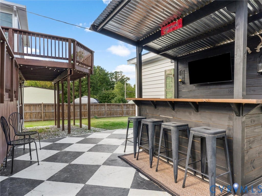 Bar area and back patio off middle deck
