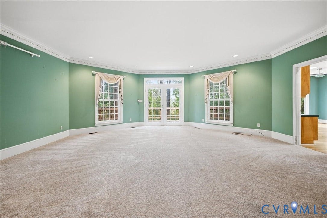 173 Waterfront Drive, Colonial Heights, VA 23834 The Great Room is the true center of this lovely home. Here you can see the French Doors leading to the deck which runs across the back of the home. Wide baseboards and Crown Molding.
