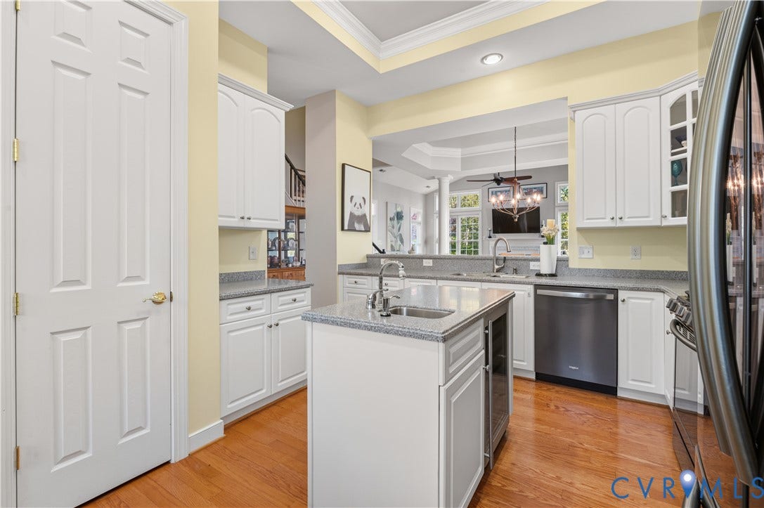 3360 Manor Grove Circle, Glen Allen, VA 23059 Kitchen featuring white cabinetry, stone-finish countertops, wood-finish flooring, recessed lighting, and a central island with a built-in beverage refrigerator