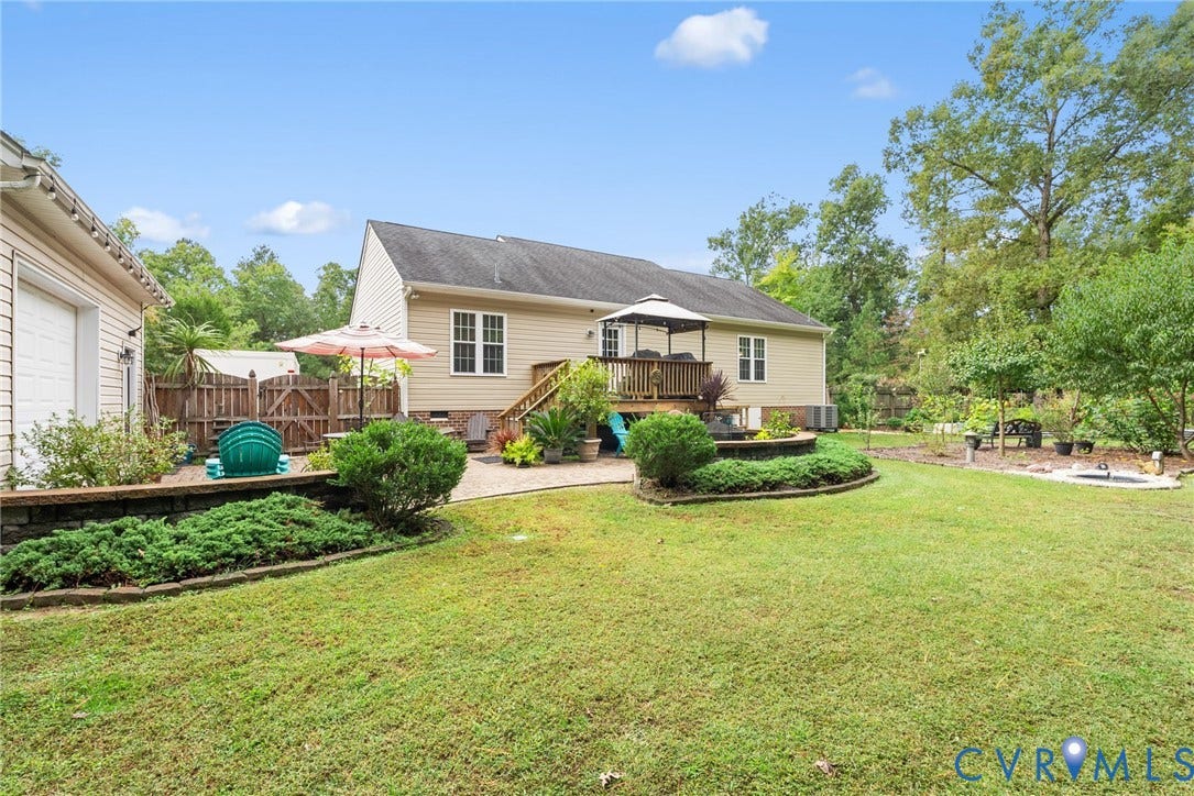 Beautfully landscaped backyard. Rear deck, patio, fenced rear yard