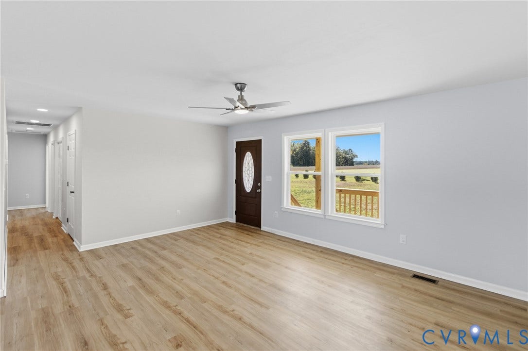 79 Dixie Drive, Mathews, VA 23050 Interior space featuring wood-finish flooring, recessed lighting, a brushed-nickel ceiling fan, and an entry door with an oval glass insert