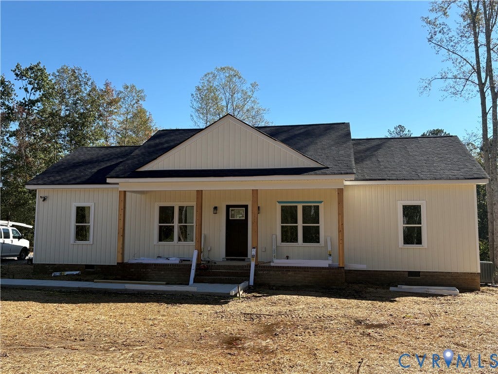 15205 Lebanon Road, Parson's Retreat, Disputanta, VA 23842 Vertical board-and-batten siding, gable roofline, covered front porch with timber posts, and masonry foundation base