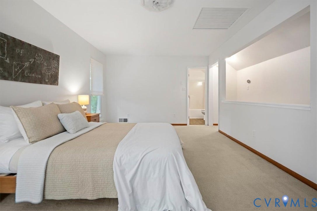 10209 Francill Court, North Chesterfield, VA 23236 Neutral-toned wall-to-wall carpeting, recessed architectural niche, ceiling-mounted light fixture, and white interior doors