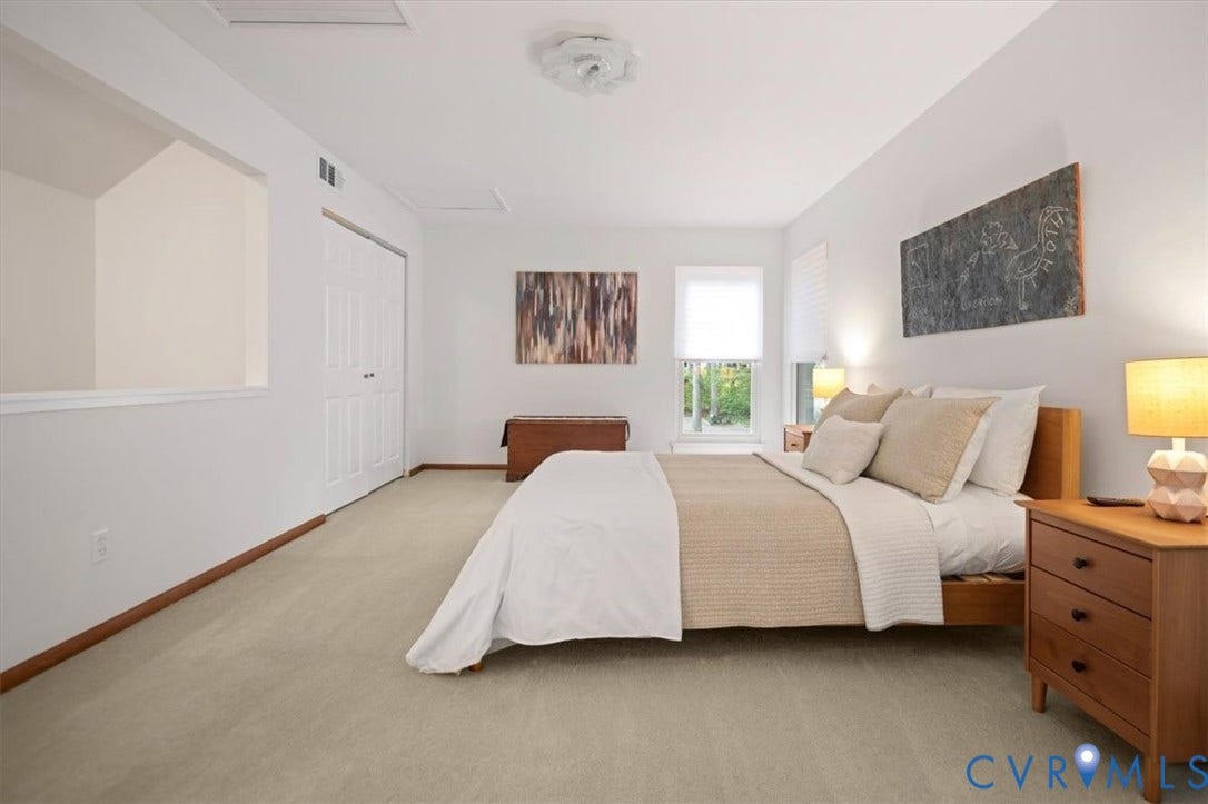 10209 Francill Court, North Chesterfield, VA 23236 Neutral-toned wall-to-wall carpeting, recessed architectural wall niche, dual-panel closet doors, and multi-pane windows with horizontal blinds