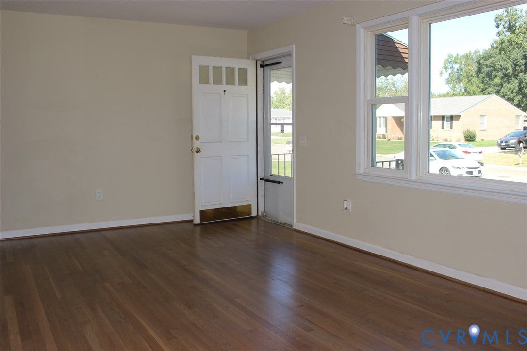 905 Williamsburg Road, Colonial Heights, VA 23834 Wood-finish flooring, multi-pane window configuration, and a multi-lite exterior entry door with brass kickplate