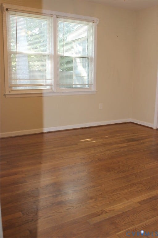 905 Williamsburg Road, Colonial Heights, VA 23834 Hardwood flooring featuring a natural finish paired with double-pane windows and integrated window blinds