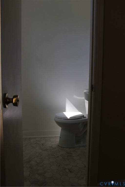 905 Williamsburg Road, Colonial Heights, VA 23834 Bathroom featuring hexagon tile flooring and a standard porcelain toilet
