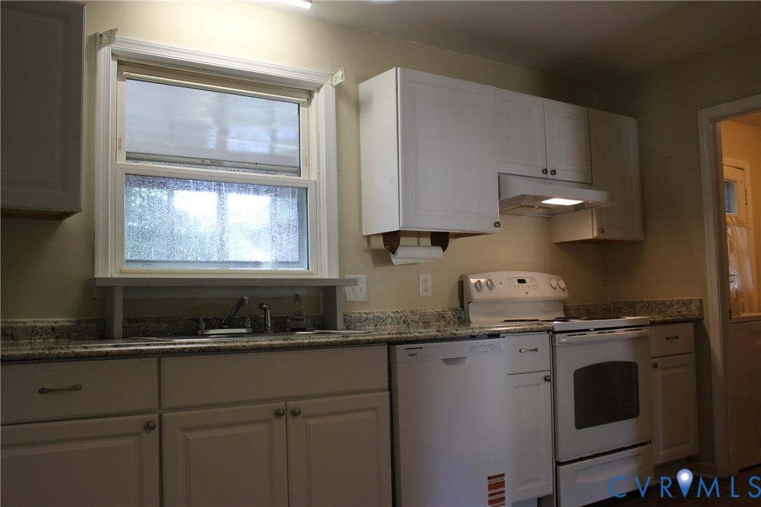 905 Williamsburg Road, Colonial Heights, VA 23834 Kitchen featuring white cabinetry, stone-finish countertops, an integrated range hood, a stainless steel sink with a faucet, and white appliances