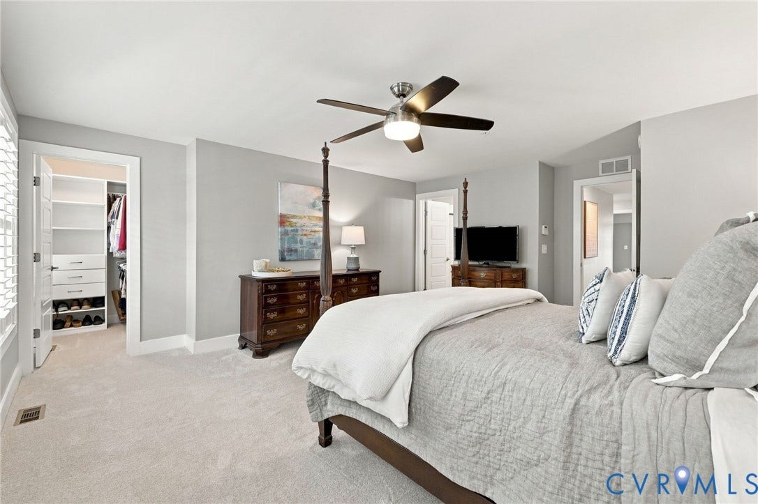 4223 Saunders Tavern Trail, #A, Henrico, VA 23233 Neutral-toned interior featuring wall-to-wall carpeting, recessed lighting, ceiling fan with integrated light fixture, and a walk-in closet with built-in shelving