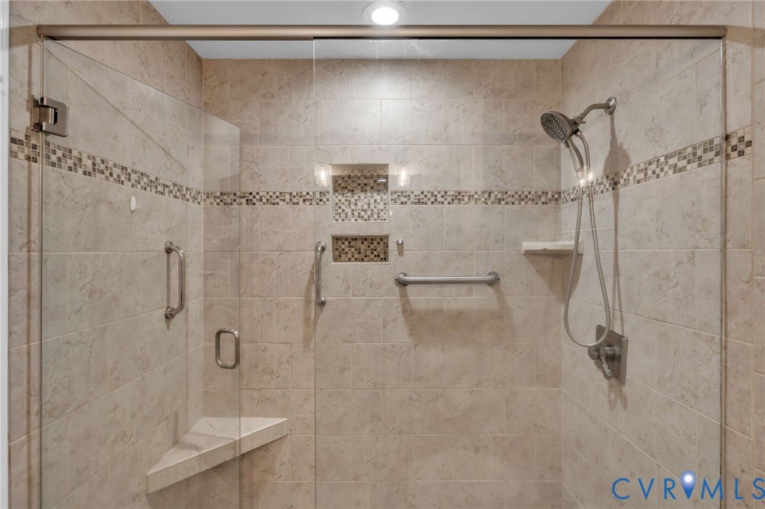 New tile shower in primary bathroom