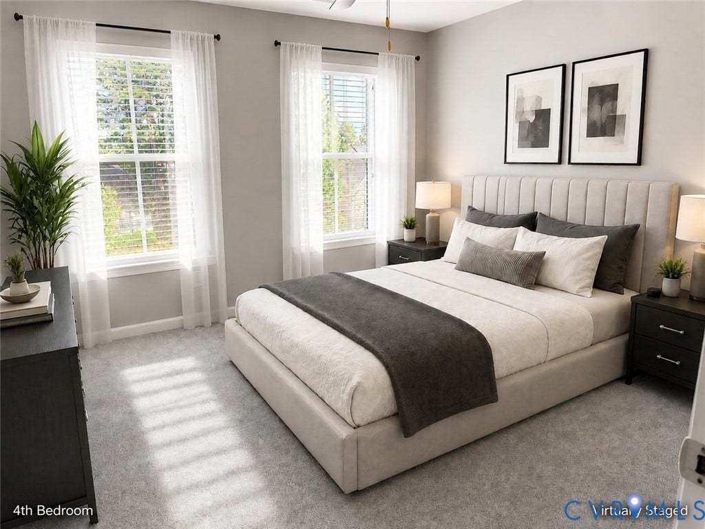 Fourth bedroom featuring plush carpet flooring, dual windows with blinds, a built-in ceiling fan, and neutral wall finishes with abundant natural light