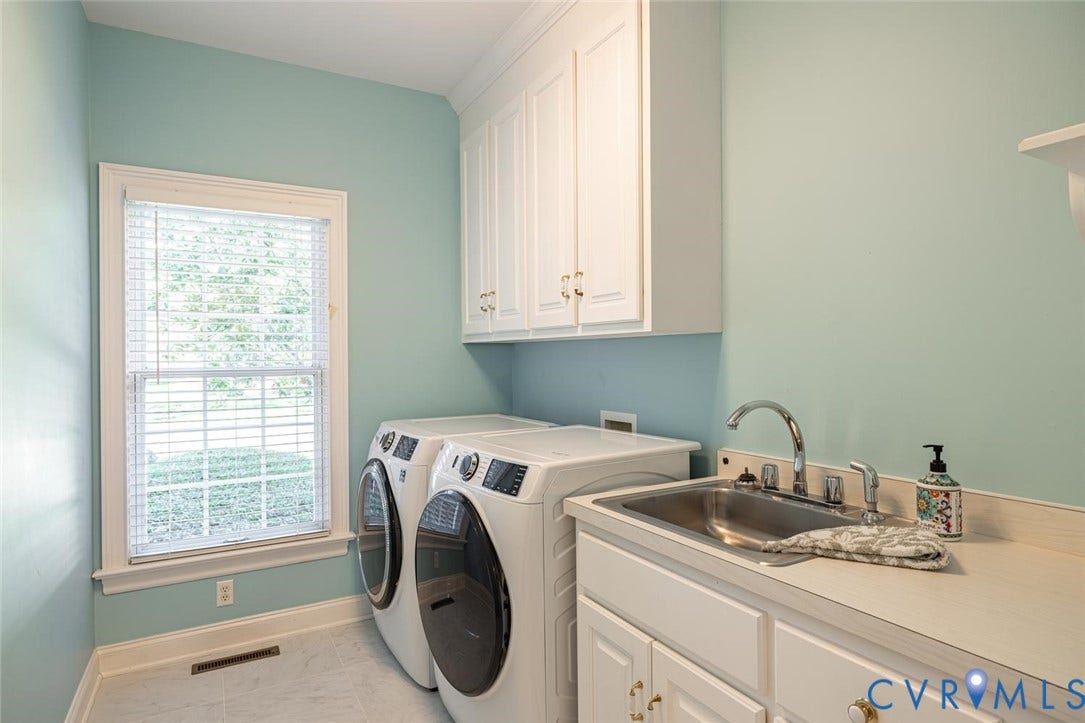 95 W Square Drive, Henrico, VA 23238 First floor laundry room with sink and cabinets