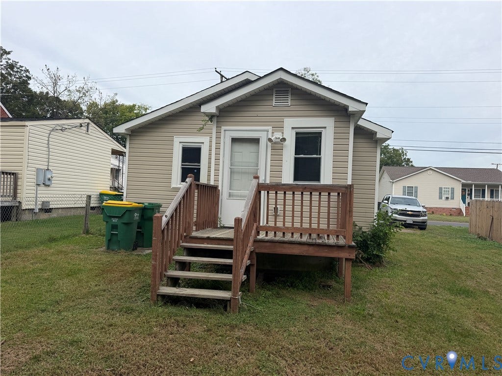 334 S 17th Avenue, Hopewell, VA 23860 Beige siding exterior featuring a wooden elevated deck and staircase
