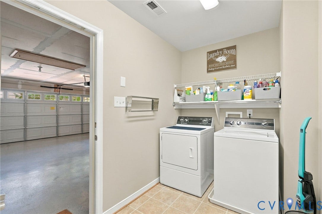 8146 Janice Avenue, Mechanicsville, VA 23111 Laundry room featuring tiled flooring and integrated wire shelving