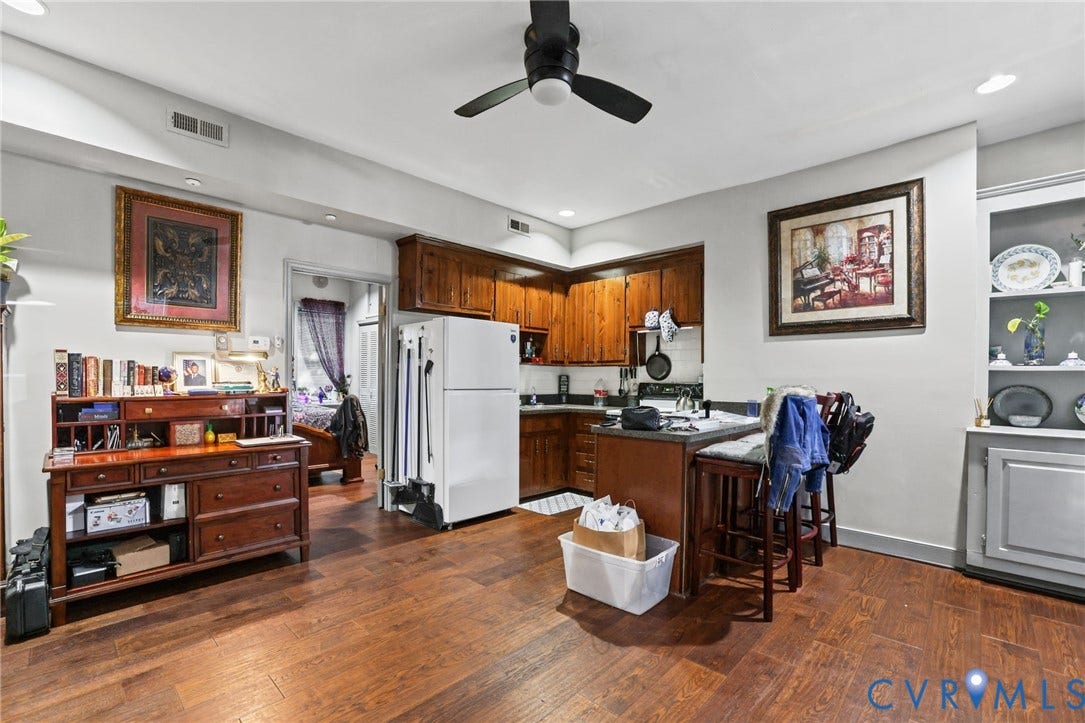 7 N 21st Street, Tobacco Row, Richmond, VA 23223 Kitchen with eating bar and living room in the downstairs unit.