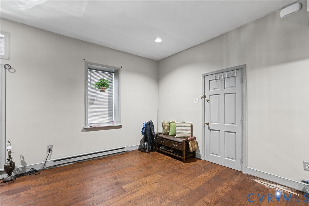 7 N 21st Street, Tobacco Row, Richmond, VA 23223 Entry and living room of the downstairs unit.