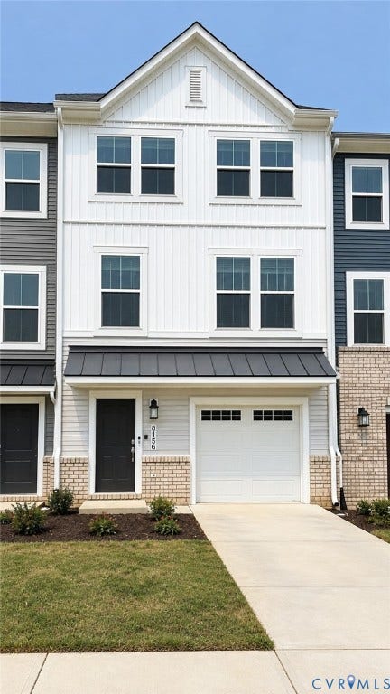 8756 Whitman Drive, Chesterfield, VA 23832 Three-story exterior featuring white vertical board-and-batten siding, horizontal light gray siding, and tan brick masonry
