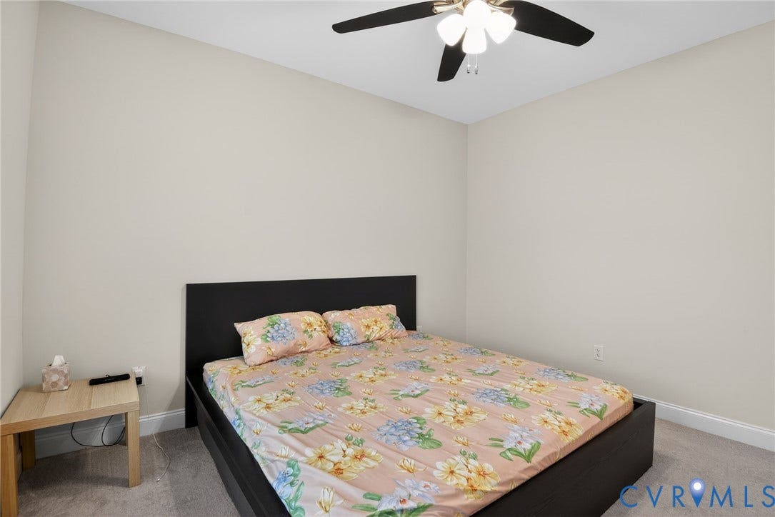 Glen Allen, VA 23059 Neutral-toned interior space featuring wall-to-wall carpeting and a ceiling-mounted fan with integrated multi-bulb lighting