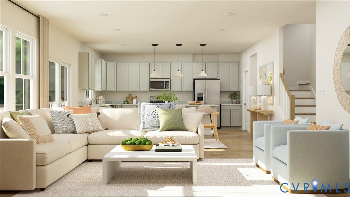 17313 Gossamer Drive, Chesterfield, VA 23120 Open-concept living space featuring wood-finish flooring, recessed lighting, cabinetry with matte-finish doors, kitchen island, and tiered stairwell with wooden handrail