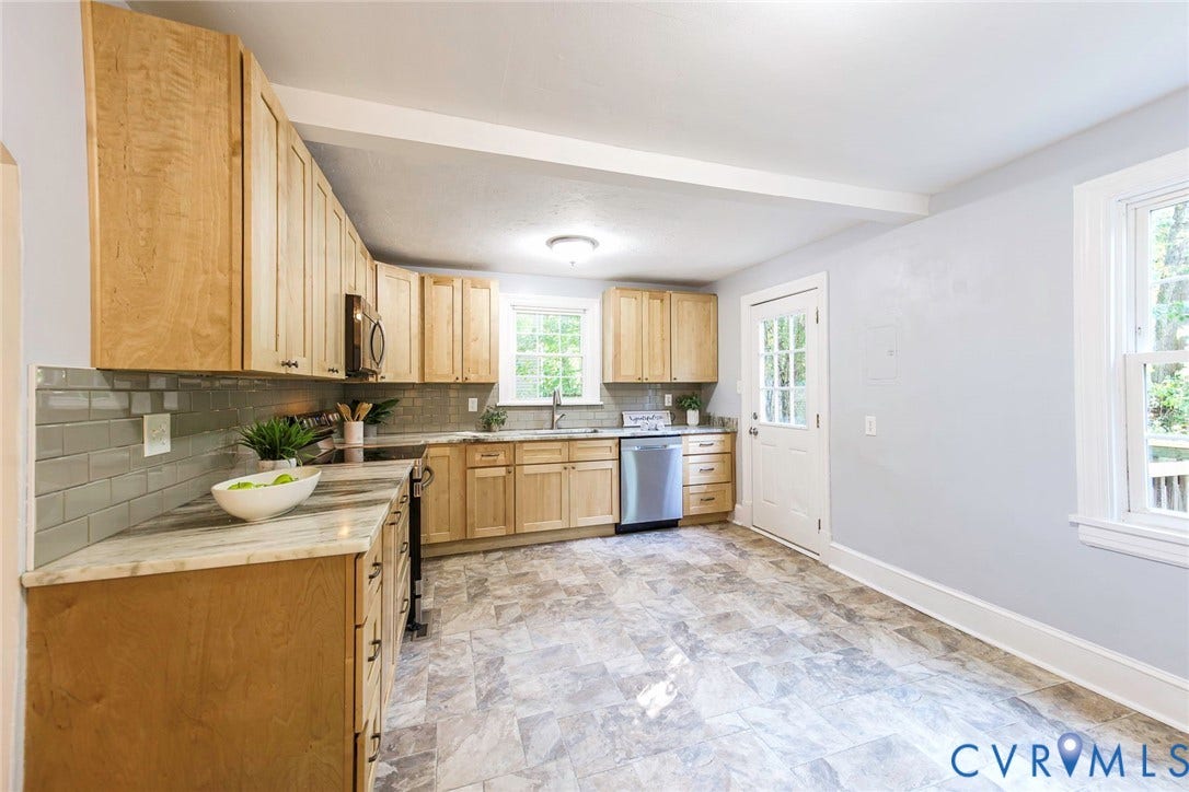 3017 Kingsdale Road, Chesterfield, VA 23237 Kitchen featuring light-finish wood cabinetry, stone-patterned countertops, grey subway tile backsplash, stainless steel dishwasher, and patterned tile flooring