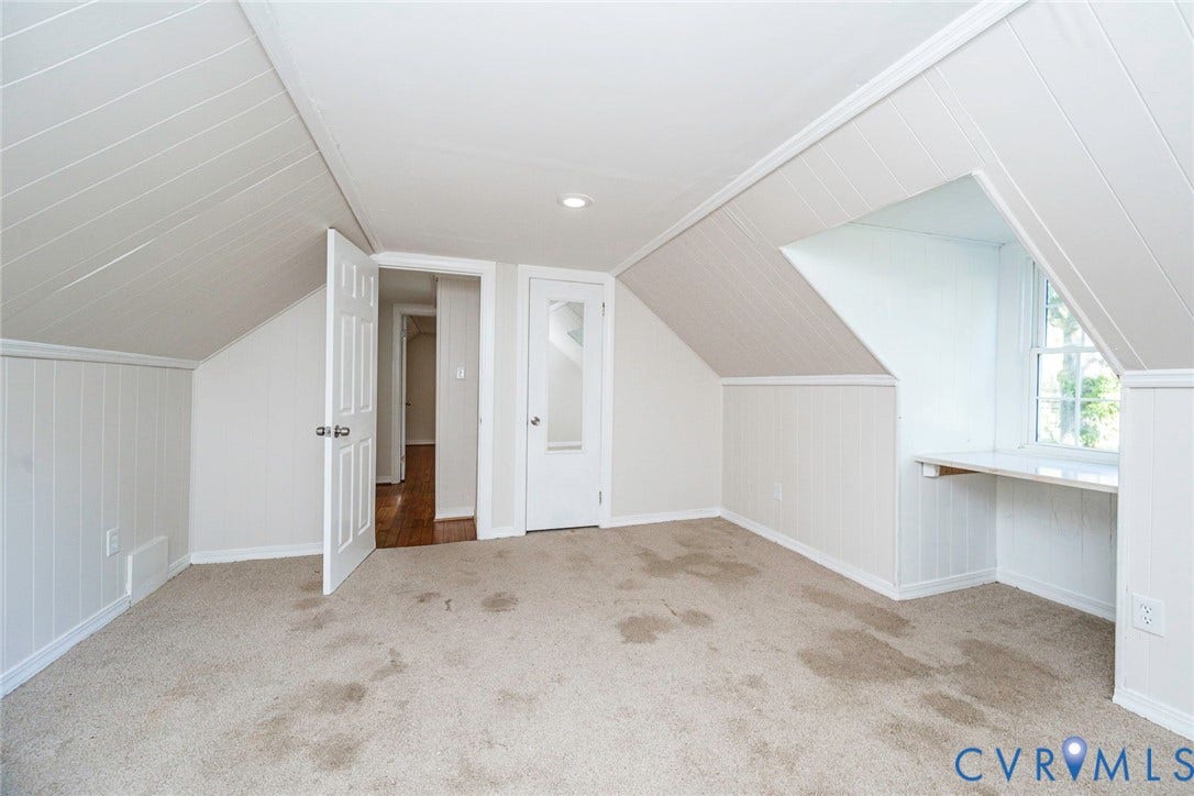 3017 Kingsdale Road, Chesterfield, VA 23237 Sloped ceiling with paneled walls, recessed lighting, carpeted flooring, and a built-in recessed desk area