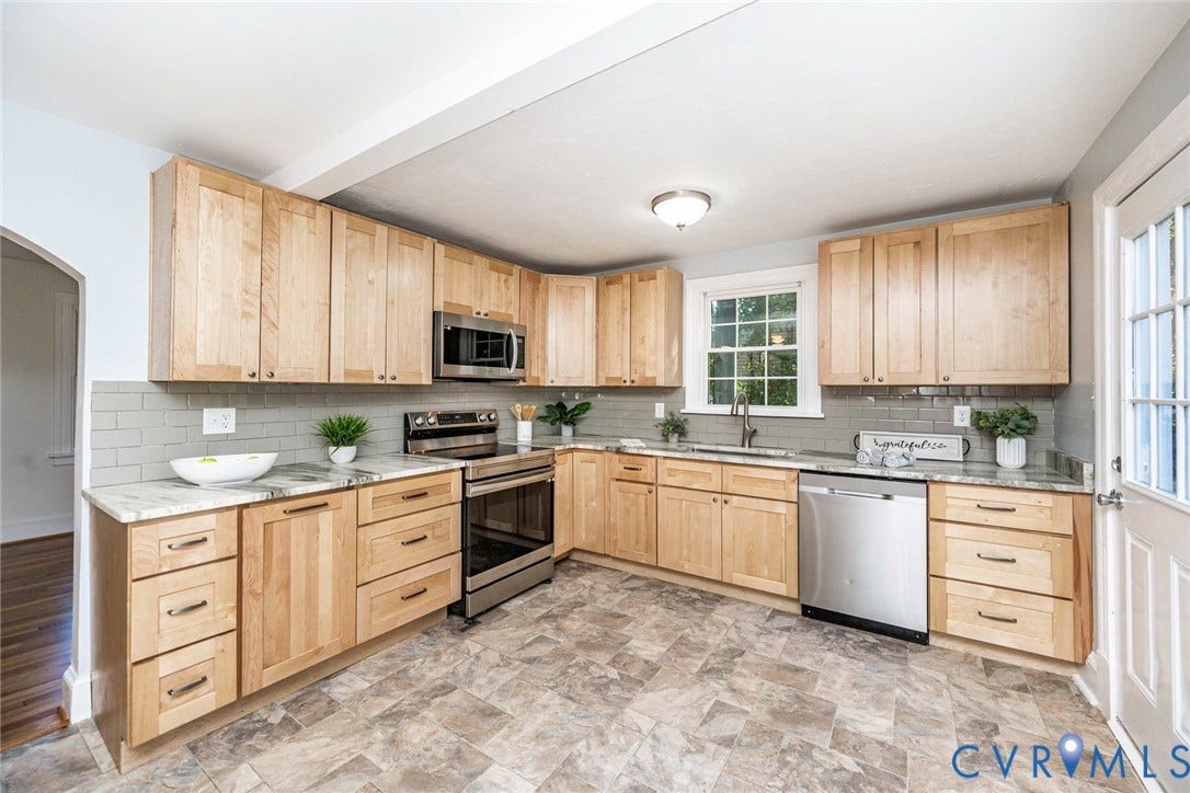 3017 Kingsdale Road, Chesterfield, VA 23237 Kitchen featuring natural wood cabinetry, stone-finish countertops, subway tile backsplash, and stainless steel appliances