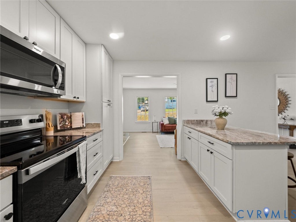 5105 Carryback Drive, Richmond, VA 23234 Kitchen featuring white cabinetry, stone-finish countertops, stainless steel appliances, and recessed lighting