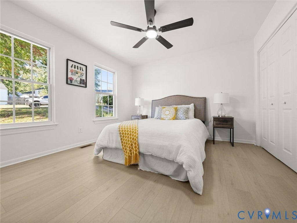5105 Carryback Drive, Richmond, VA 23234 Wood-finish flooring, multi-pane windows, and a ceiling-mounted light fixture with fan
