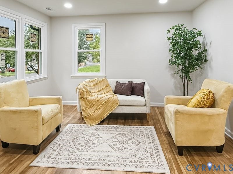 2500 ford Avenue, Richmond, VA 23223 Neutral-toned interior featuring wood-finish flooring, recessed lighting, and white-framed multi-pane windows