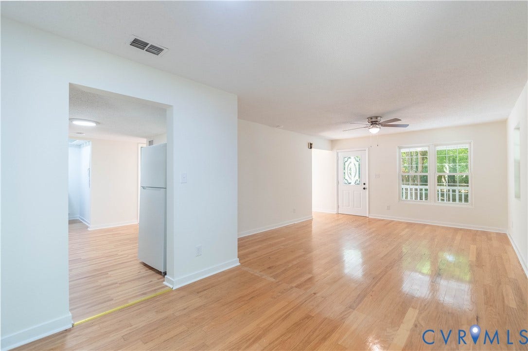 9045 Blounts Corner Road, Smithfield, VA 23430 Open interior featuring wood-finish flooring, recessed ceiling lighting, a ceiling fan, and multi-pane windows