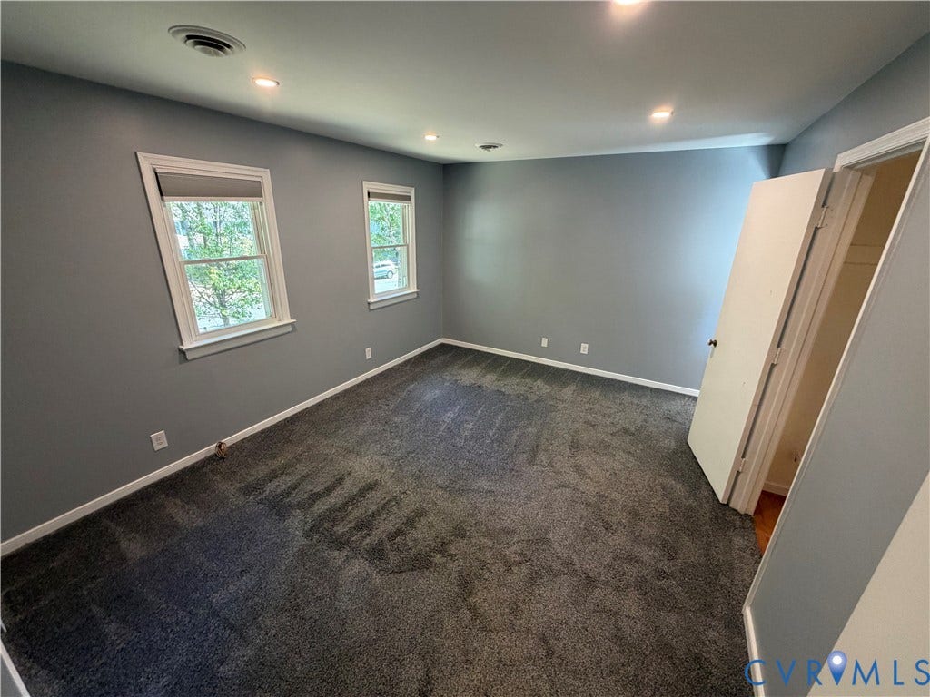 2228 Early Settlers Road, Midlothian, VA 23235 Room featuring neutral wall tones, recessed lighting, wall-to-wall carpeting, and double-hung windows