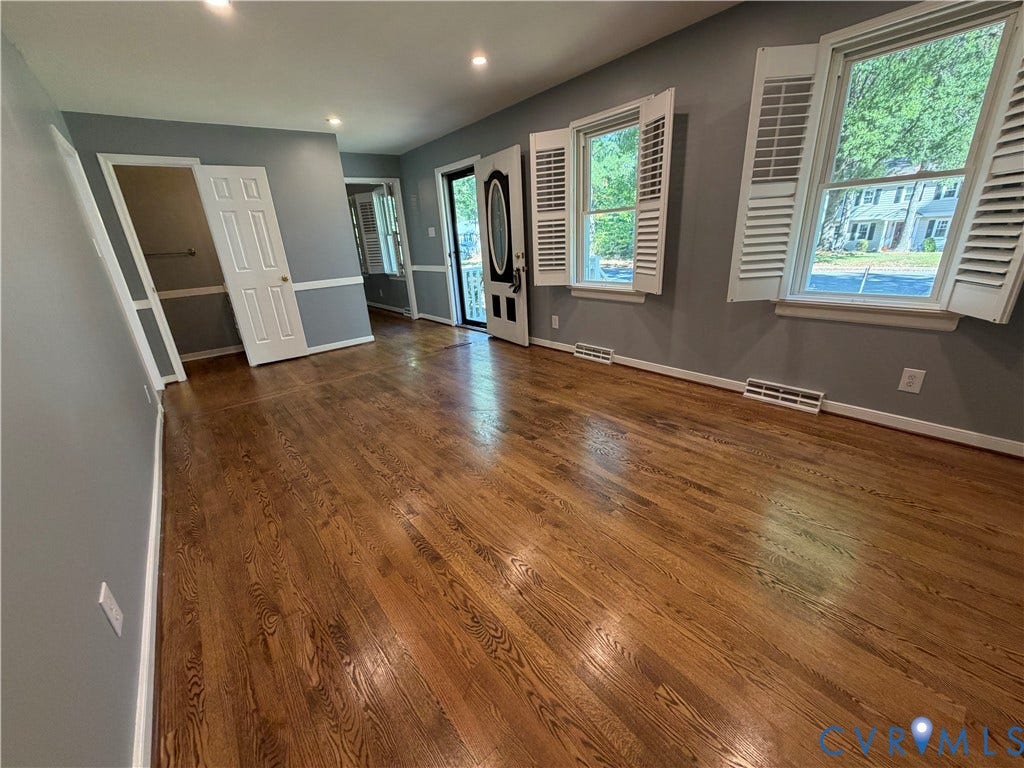 2228 Early Settlers Road, Midlothian, VA 23235 Hardwood flooring, chair rail molding, multi-paneled interior doors, and operable louvered shutters
