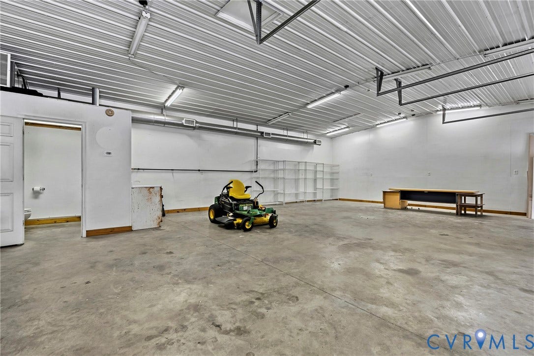 11401 Pinhook Road, Rockville, VA 23146 30'x40', 1,200 sqft detached workshop. lift-ready, AC, heated floors, bathroom