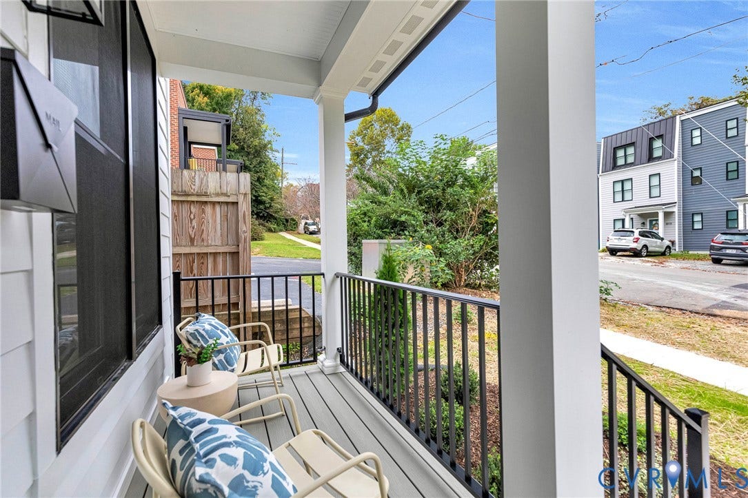 3021 E Franklin Street, St. John's Church, Richmond, VA 23223 Covered front porch featuring gray composite decking, black metal railings, and square support columns