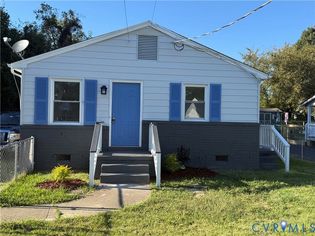 120 N New Avenue, Henrico, VA 23075 Single-story exterior featuring lap siding, contrasting brick masonry, blue decorative shutters, and white railings flanking the entryway