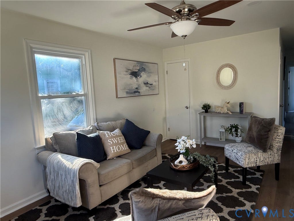 120 N New Avenue, Henrico, VA 23075 Neutral-toned interior featuring wood-finish flooring, a multi-blade ceiling fan with an integrated light fixture, and a single-hung window with decorative trim