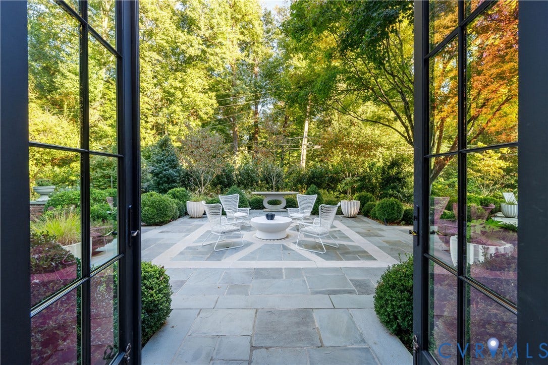 301 Lock Lane, Windsor Farms, Richmond, VA 23226 The family room opens up to the bluestone terrace with historic millstone.