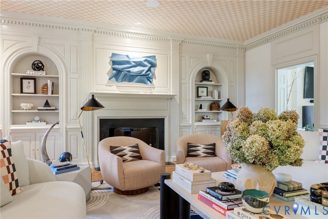 301 Lock Lane, Windsor Farms, Richmond, VA 23226 Arched built-ins and original paneling frame the fireplace, with dedicated art lighting and in-ceiling Sonos speakers.