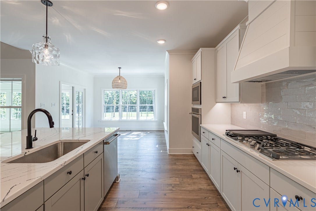 15148 Johns Trace Circle, Millwood Landing, Montpelier, VA 23192 Photo from Boone Homes Gallery; photo of similar home, not home for sale; upgrades shown