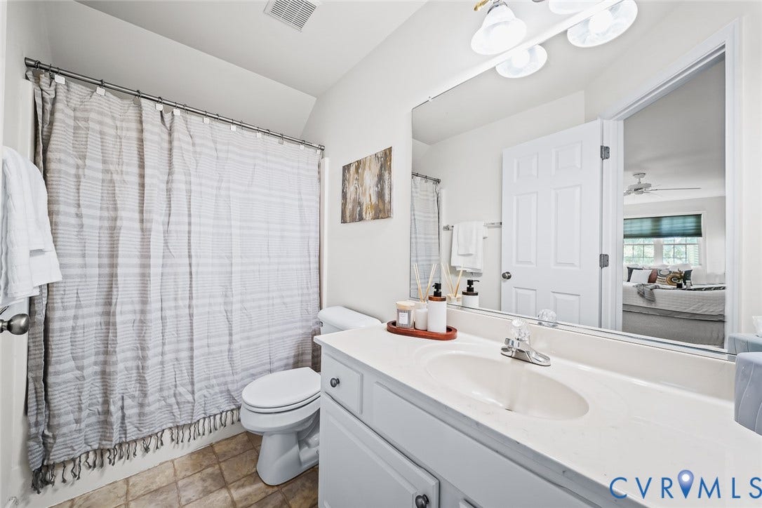 2nd Floor Primary Bathroom featuring tub/shower combo