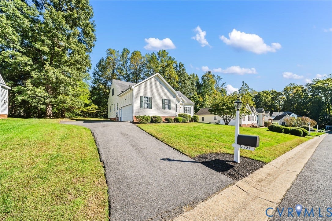 Paved Driveway and Side Entry 2 Car Garage
