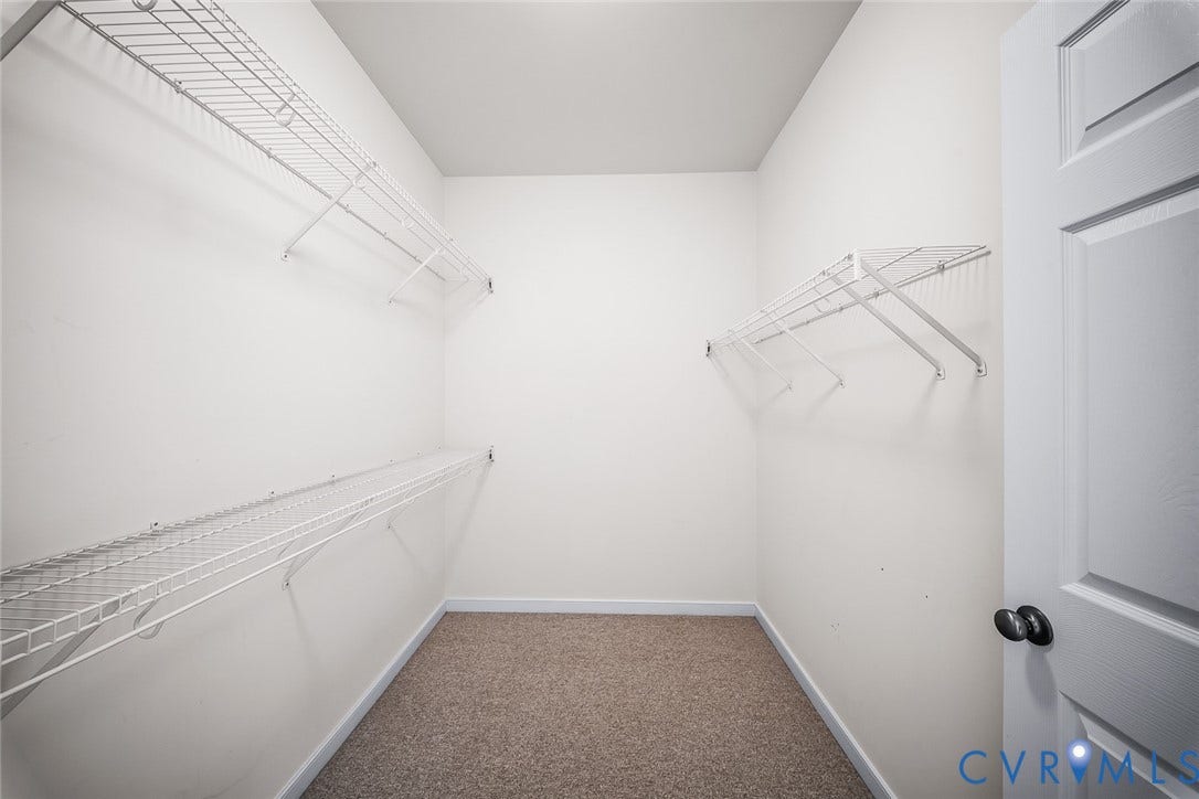 First Floor Primary with walk-in closet and ensuite